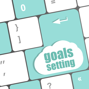 Goals setting button on keyboard with soft focus